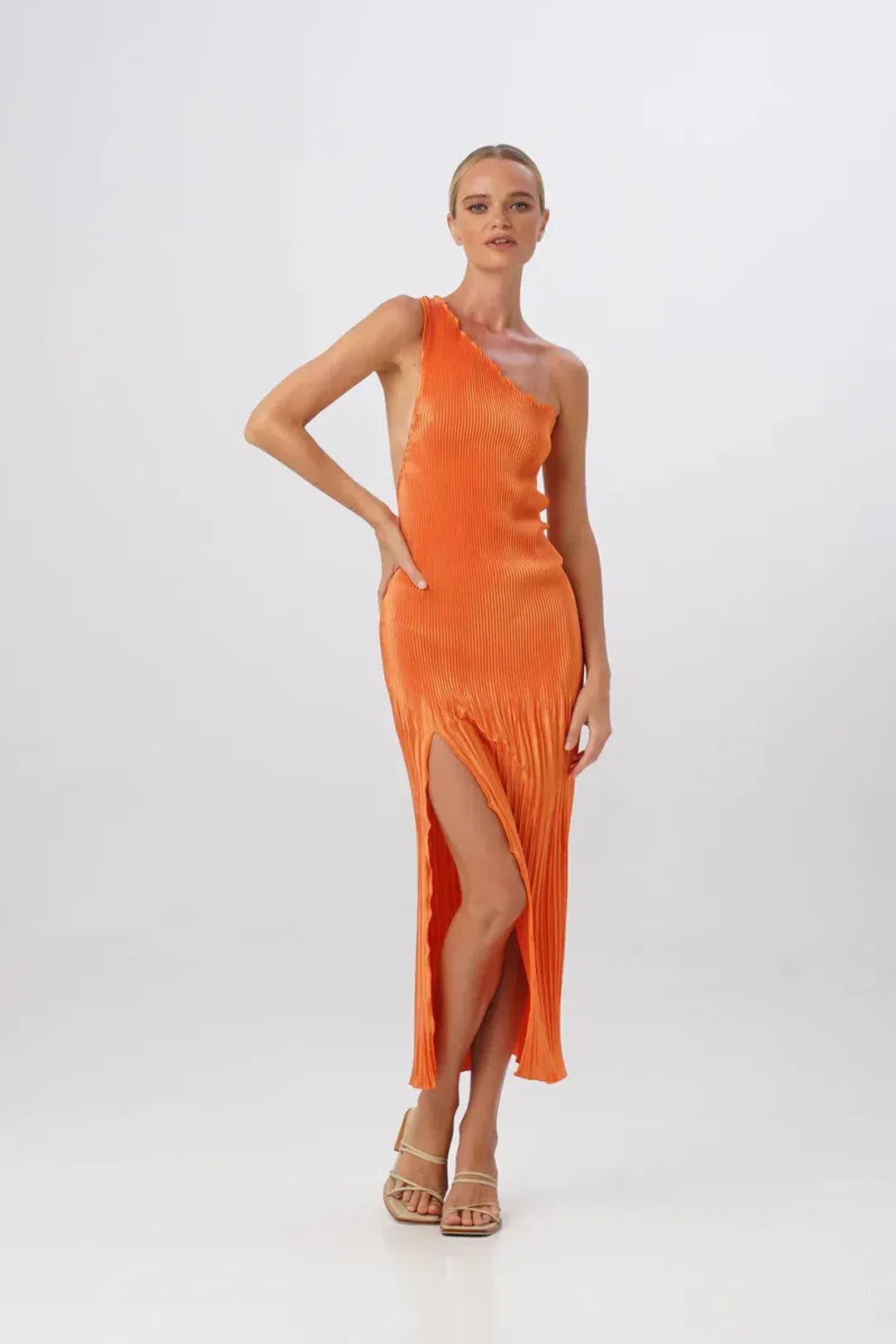 L'ldee Naomi Gown Tangelo Orange available for hire at The Label Hire.